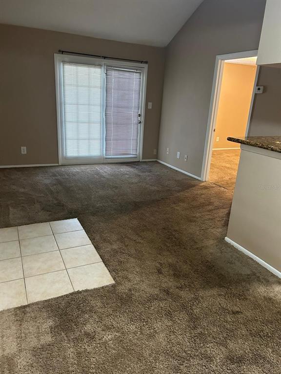 238 Afton Square, Unit 305 Altamonte Springs, FL 32714 - Photo 4 of 13 an empty room with an empty space and window