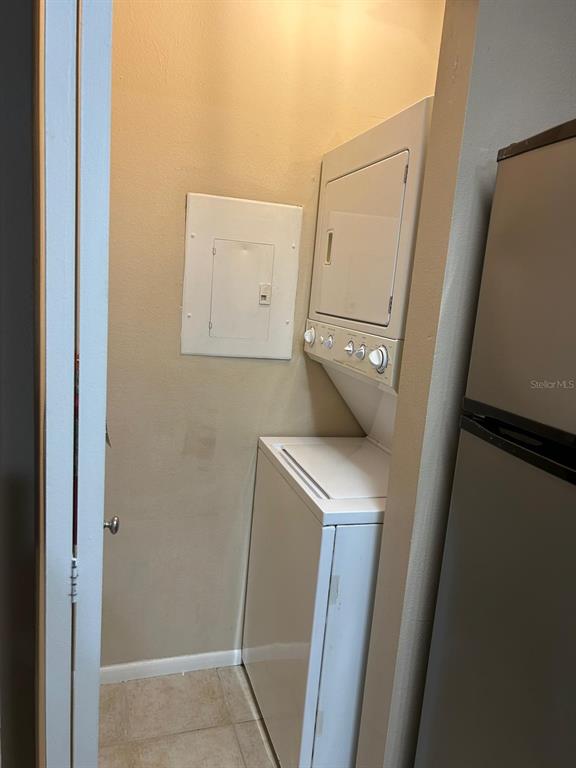 238 Afton Square, Unit 305 Altamonte Springs, FL 32714 - Photo 7 of 13 a utility room with dryer and washer