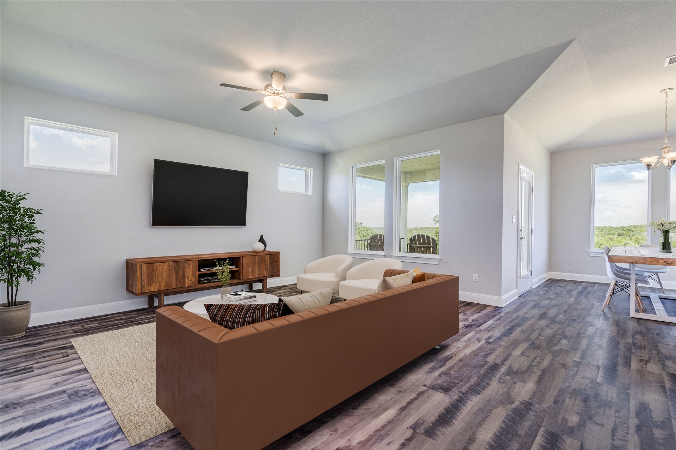 130 Sierra Blanca Road Dripping Springs, TX 78620 - Photo 8 of 24 a living room with furniture and a flat screen tv