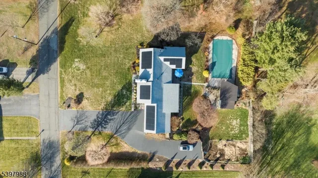 an aerial view of houses with outdoor space
