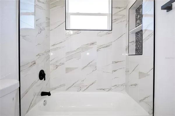 a bathroom with a bathtub