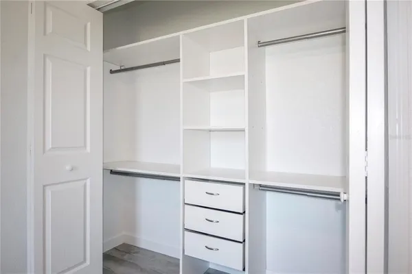 a view of an empty walk in closet