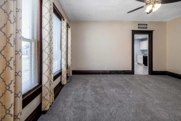 an empty room with windows