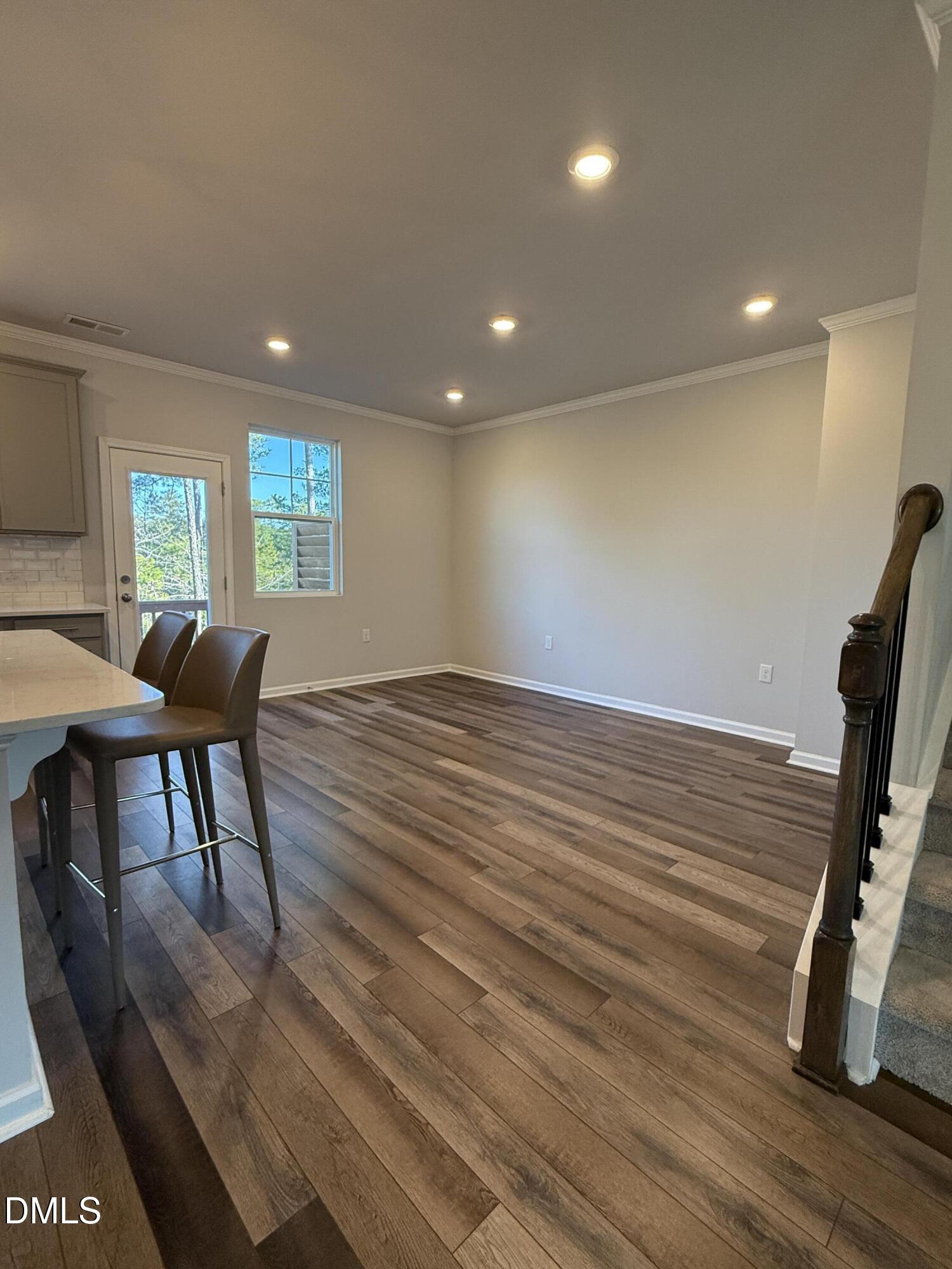 1092 Shoreside Drive Durham, NC 27713 - Photo 6 of 6 a view of a livingroom with furniture window and wooden floor