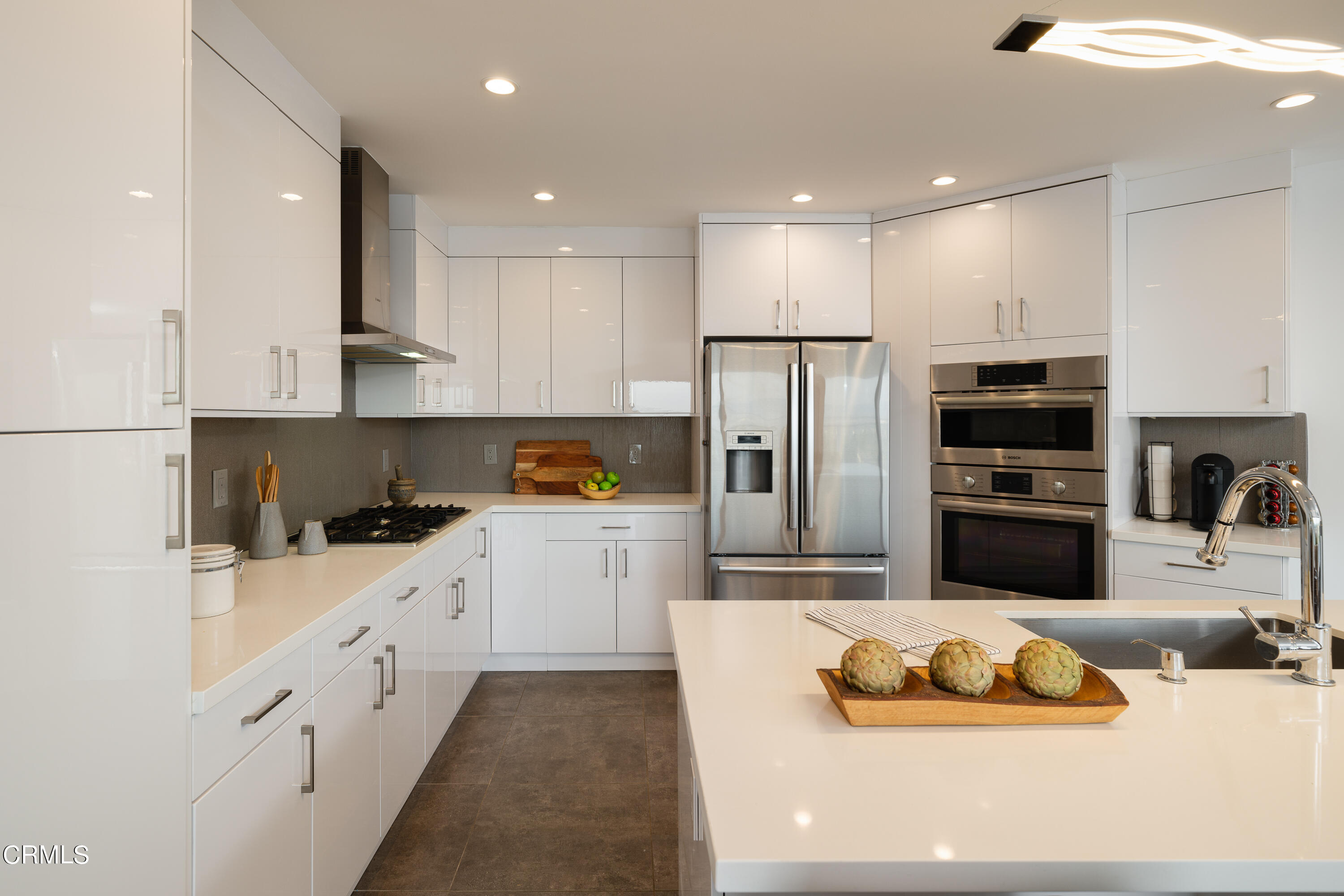 1020 Briarcliff Road Monrovia, CA 91016 - Photo 18 of 72 a kitchen with stainless steel appliances kitchen island granite countertop a sink and refrigerator