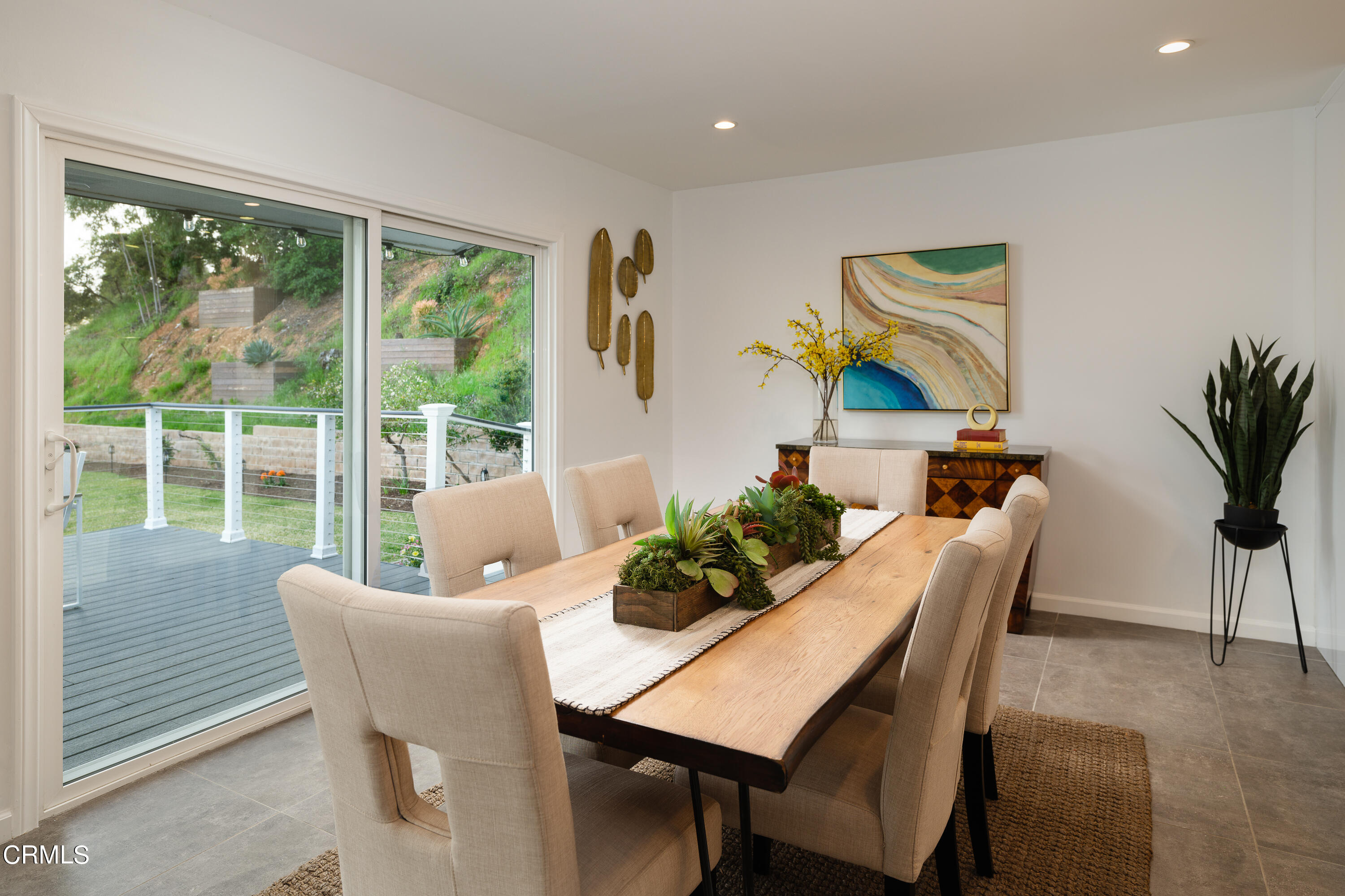 1020 Briarcliff Road Monrovia, CA 91016 - Photo 21 of 72 a dining room with furniture potted plants and wooden floor
