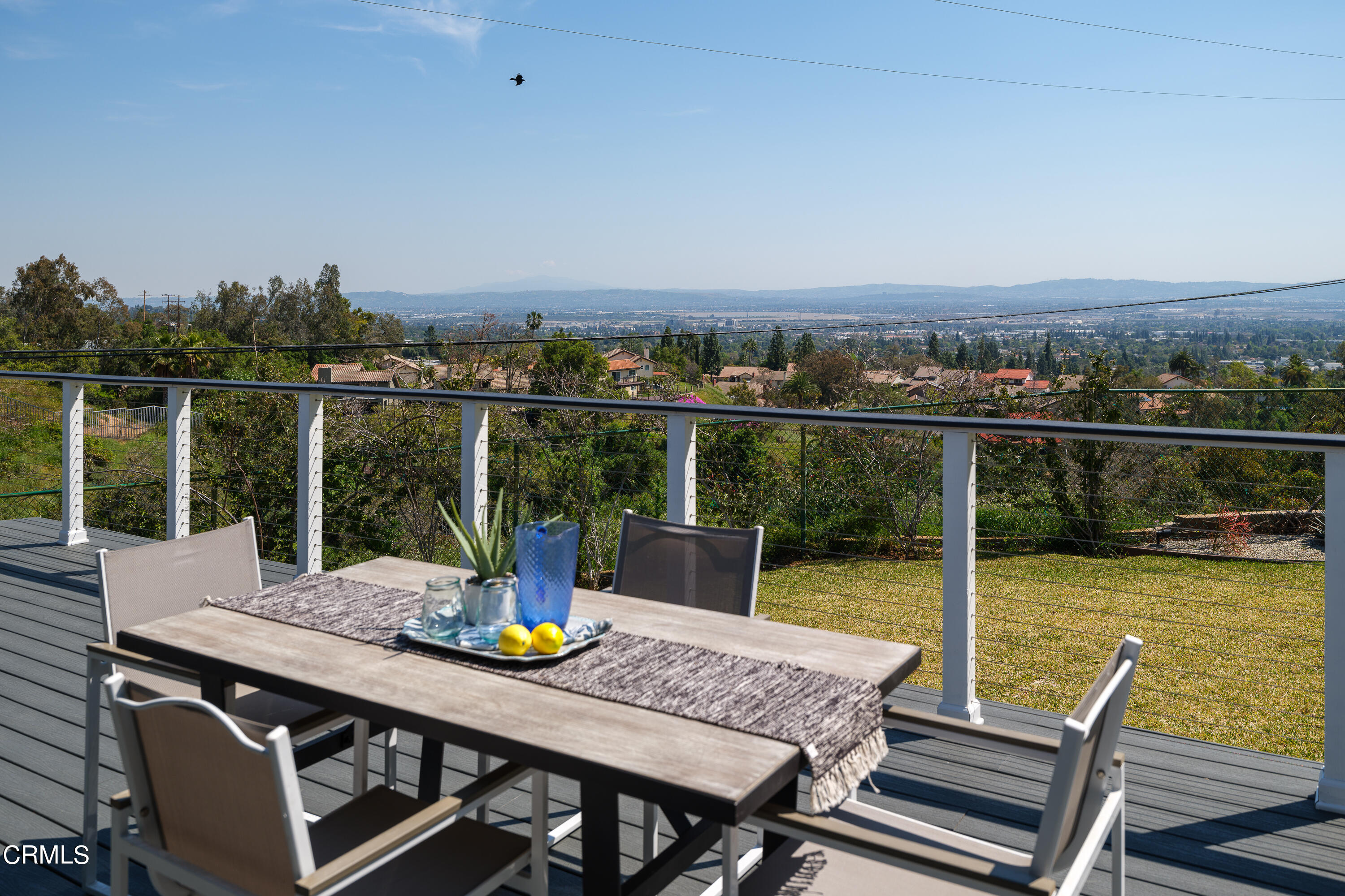 1020 Briarcliff Road Monrovia, CA 91016 - Photo 40 of 72 a view of a balcony with mountain view and wooden floor