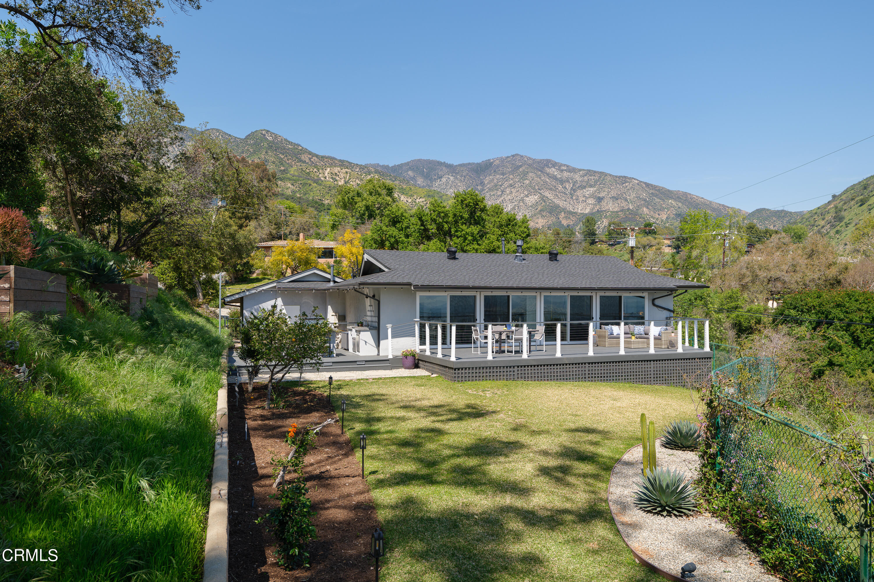 1020 Briarcliff Road Monrovia, CA 91016 - Photo 48 of 72 a front view of a house with a yard and swimming pool