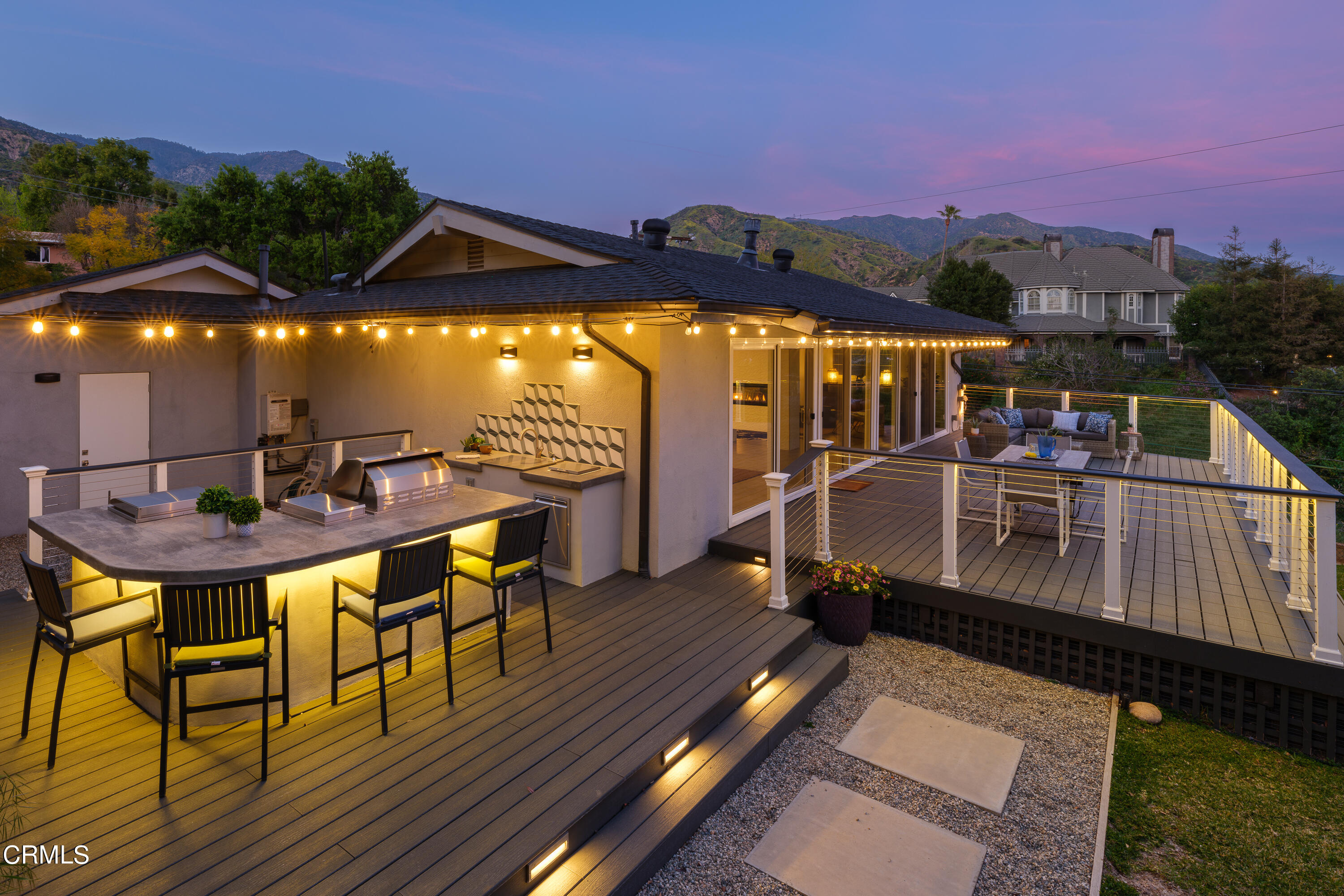 1020 Briarcliff Road Monrovia, CA 91016 - Photo 61 of 72 a view of a patio with table and chairs with wooden floor and fence