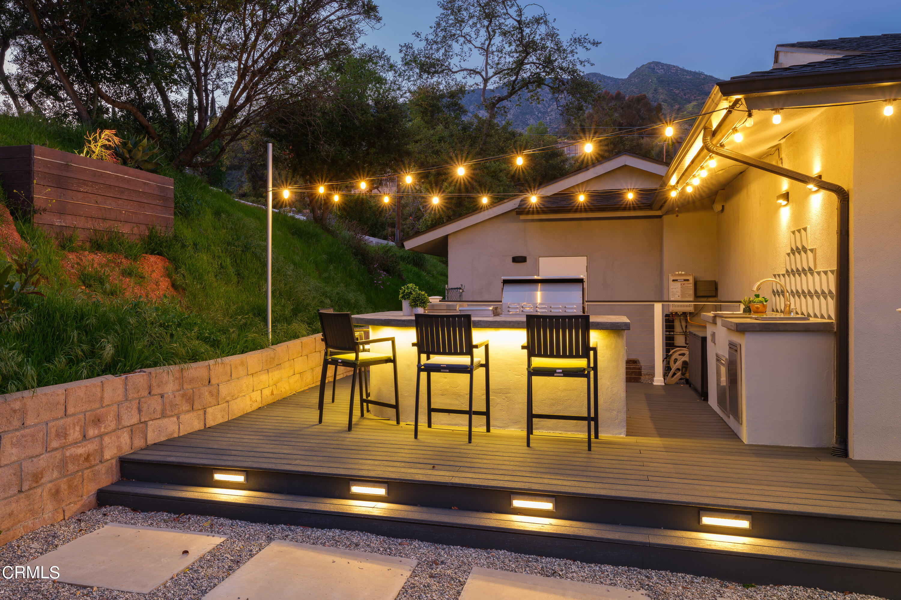 1020 Briarcliff Road Monrovia, CA 91016 - Photo 62 of 72 a view of a patio with table and chairs with wooden floor and fence
