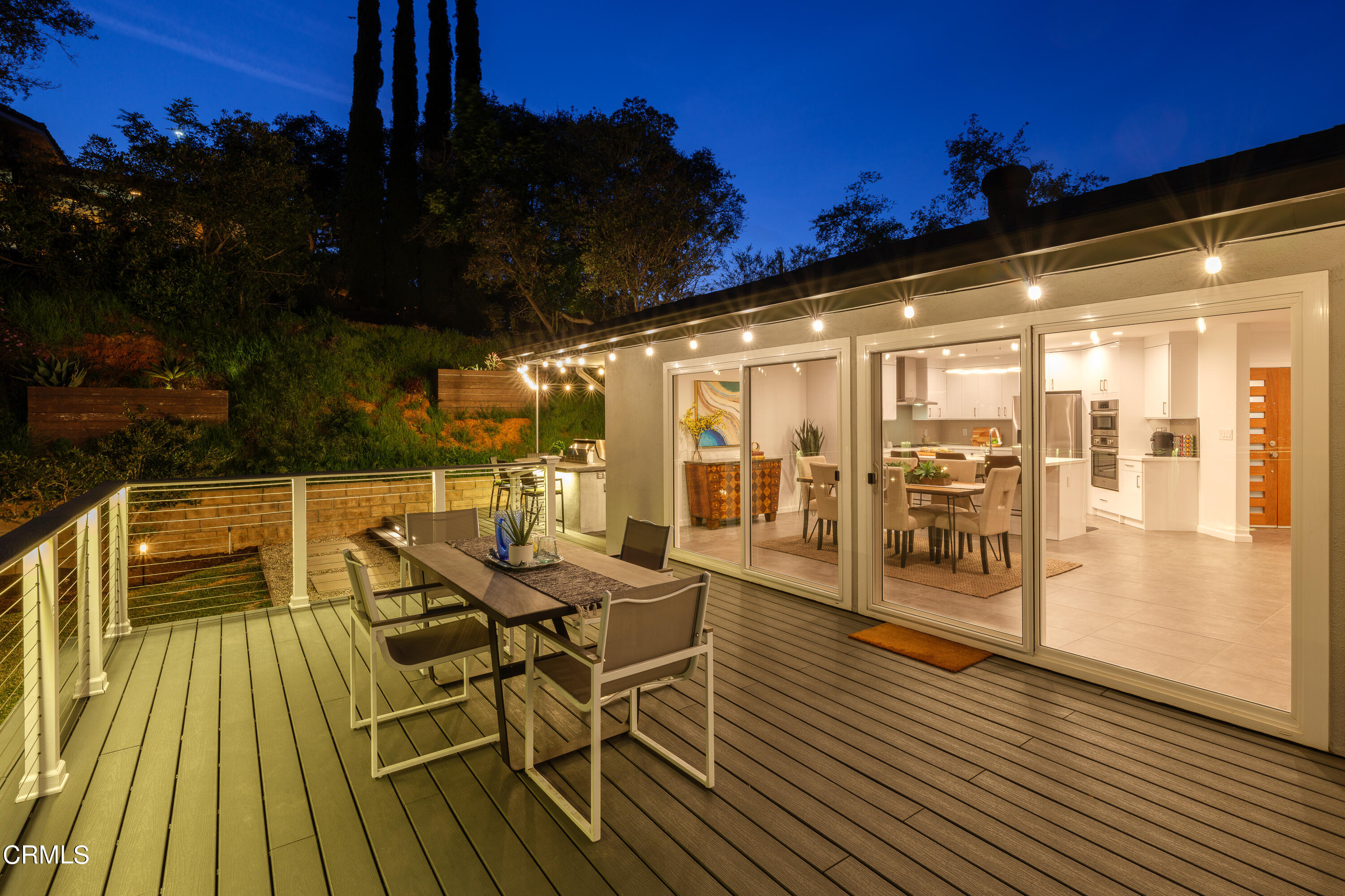 1020 Briarcliff Road Monrovia, CA 91016 - Photo 67 of 72 a view of a patio with table and chairs with wooden floor and fence
