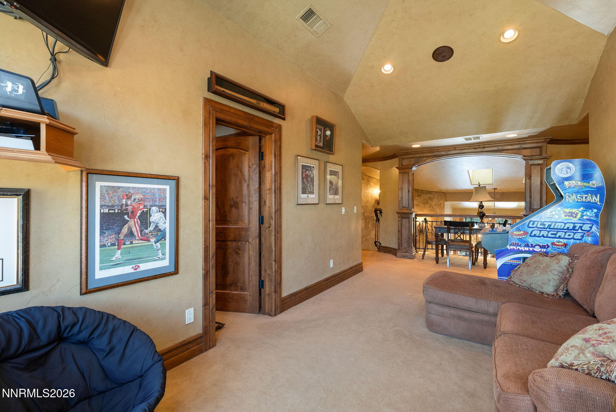 123 Andrew Lane Reno, NV 89521 - Photo 30 of 50 a living room with furniture and a chandelier