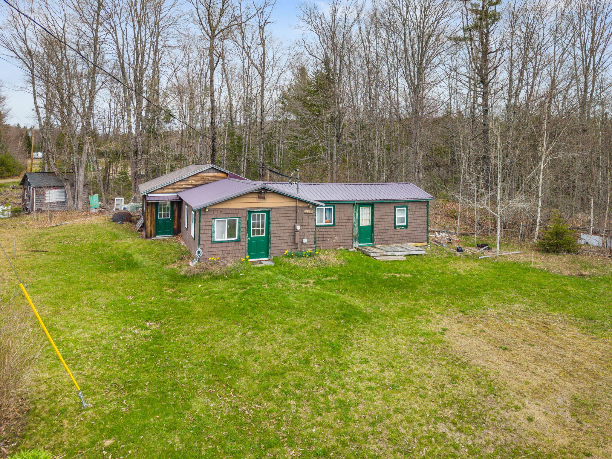 476 East Thorndike Road Thorndike, ME 04986 - Photo 2 of 33 1-web-or-mls-DJI_20260504111547_0677_D