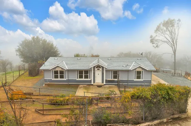 a view of a large body of water with a building in the background