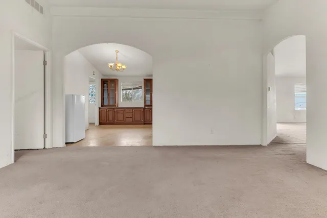 a view of an empty room and window