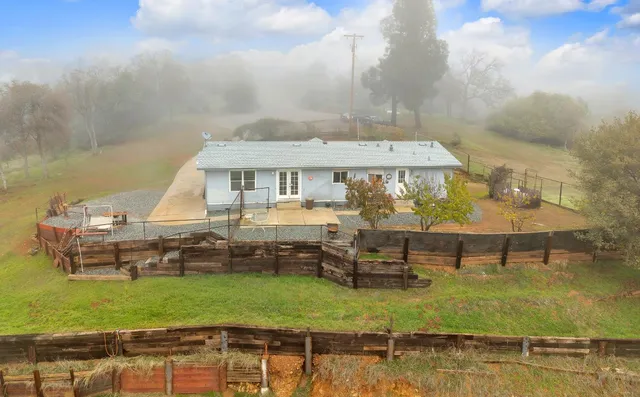swimming pool view with a seating space