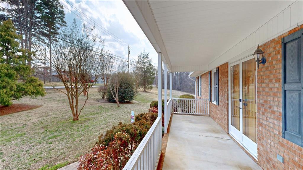 6919 East Holly Grove Road Thomasville, NC 27360 - Photo 6 of 50 27.7 x 7.11 covered porch