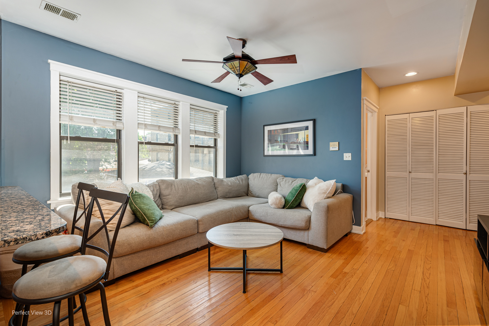 2111 West Arthur Avenue, Unit 1S Chicago, IL 60645 - Photo 15 of 27 a living room with furniture and a large window