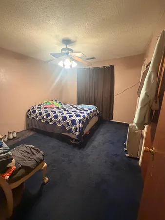 a bathroom with a toilet and a sink