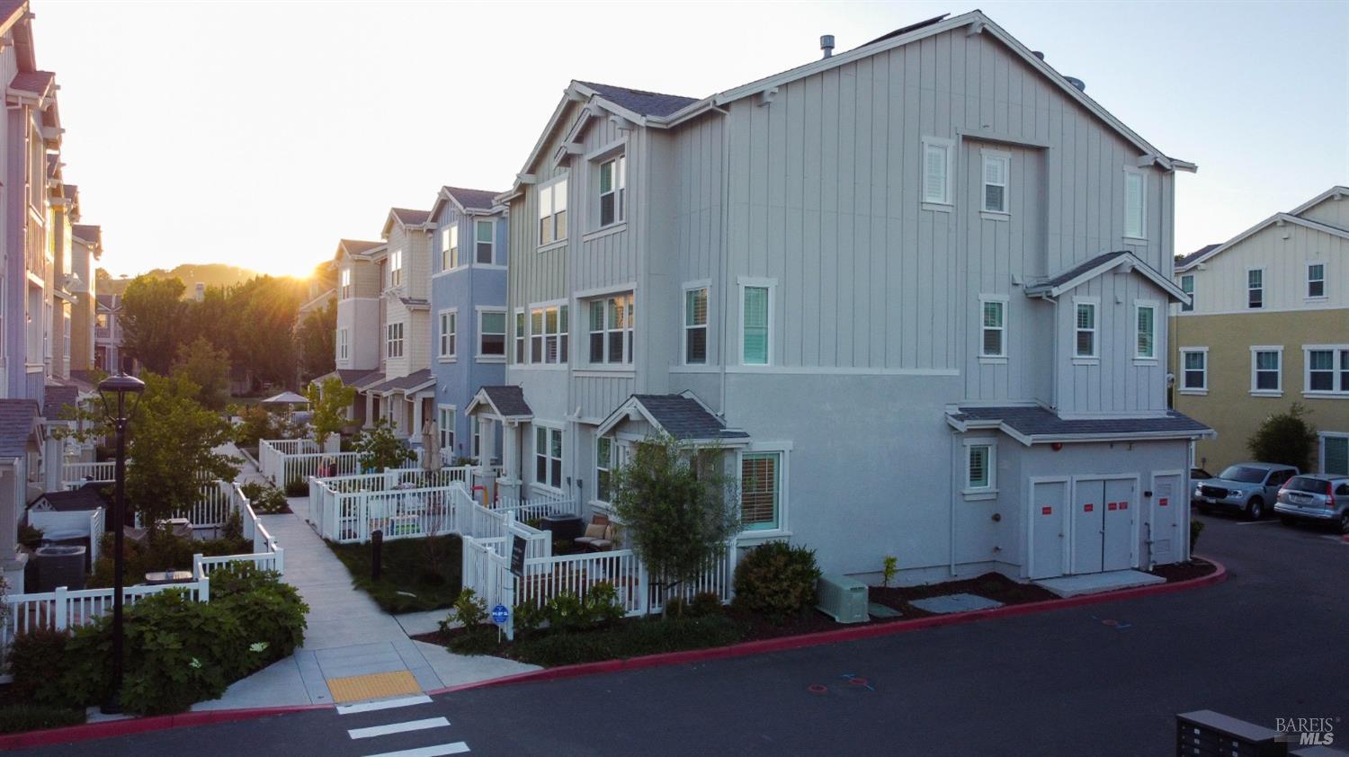 a front view of a house with parking area