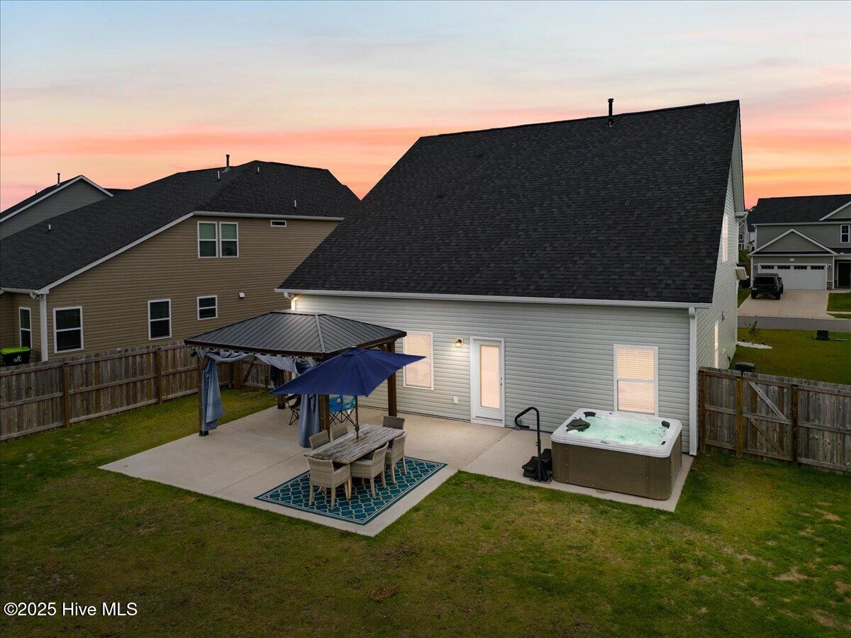 5735 Orchardgrass Road Leland, NC 28451 - Photo 8 of 54 Enjoy Sunsets from the Hot Tub