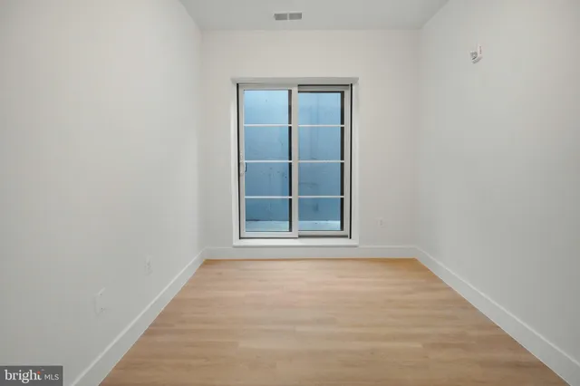 an empty room with window