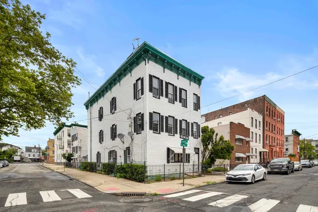 a view of a street with buildings