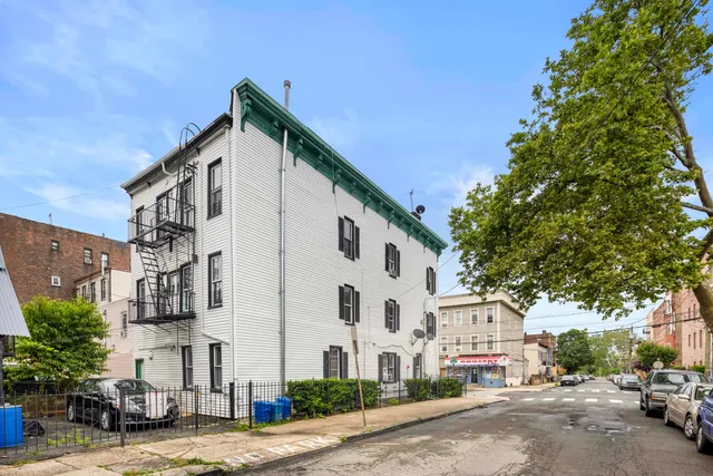 a view of a street with buildings