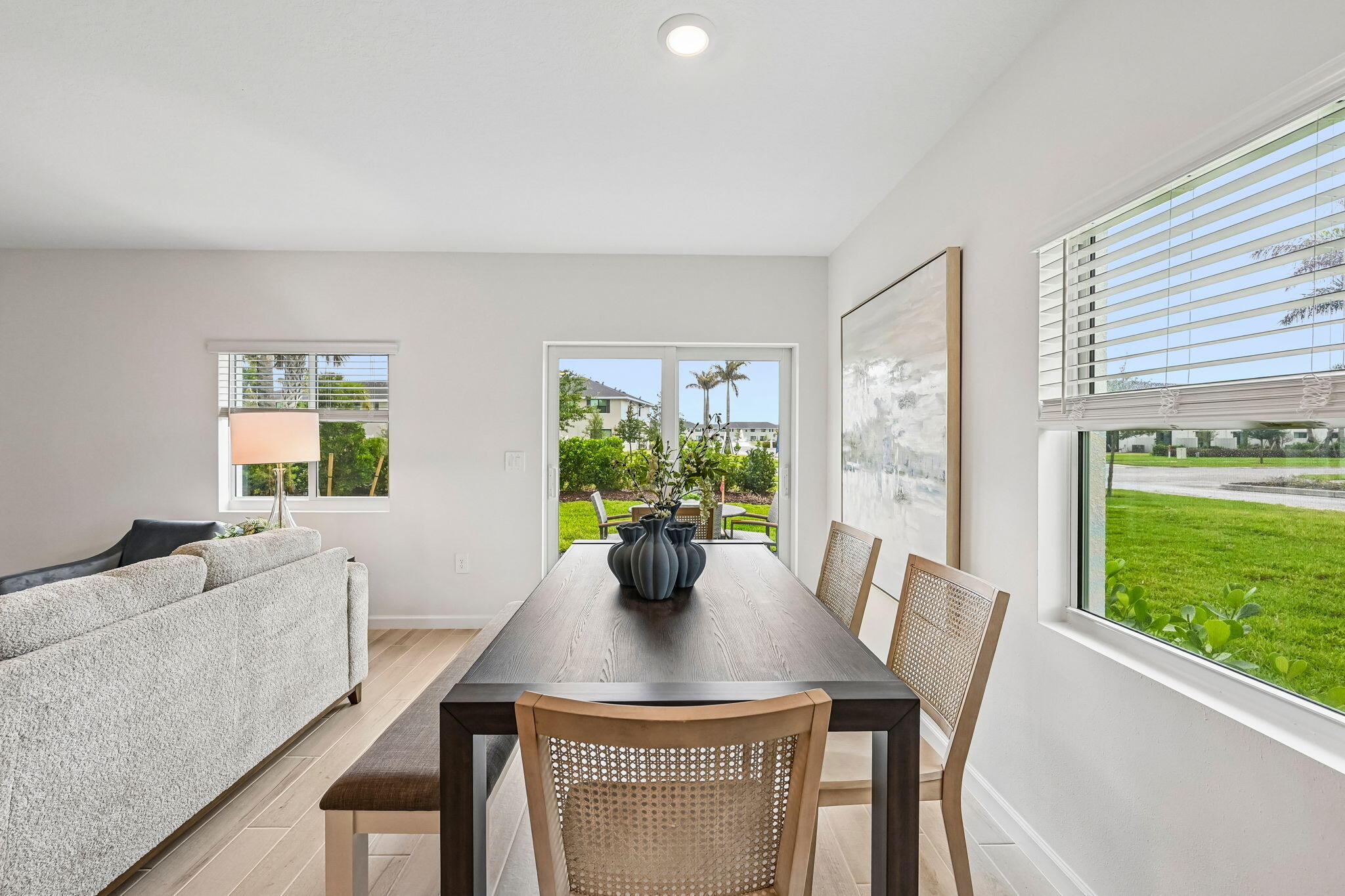 12957 Southwest Forli Way Port St. Lucie, FL 34987 - Photo 12 of 31 a dining room with furniture window and outside view