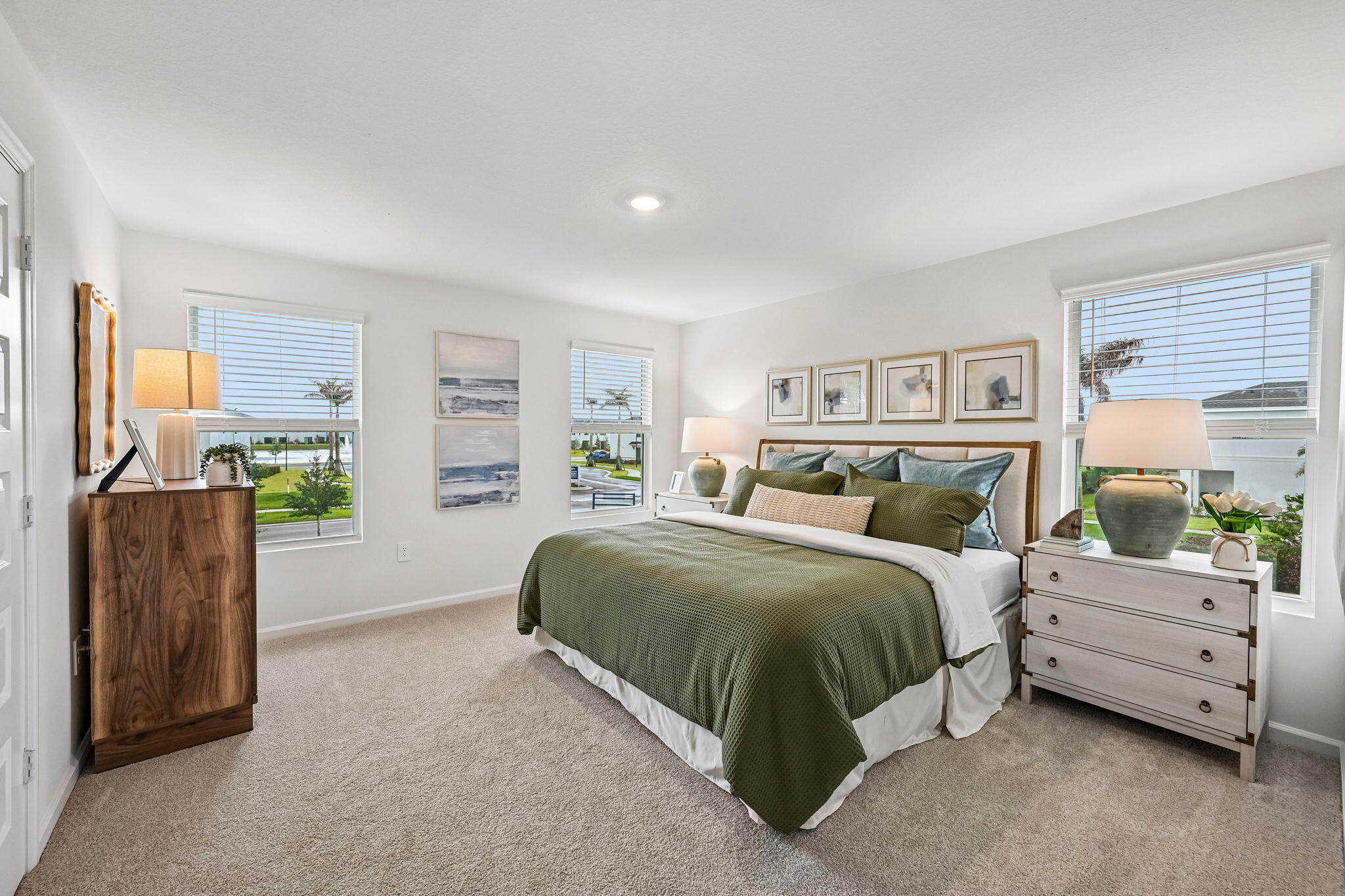 12957 Southwest Forli Way Port St. Lucie, FL 34987 - Photo 15 of 31 a bedroom with a bed and a couch