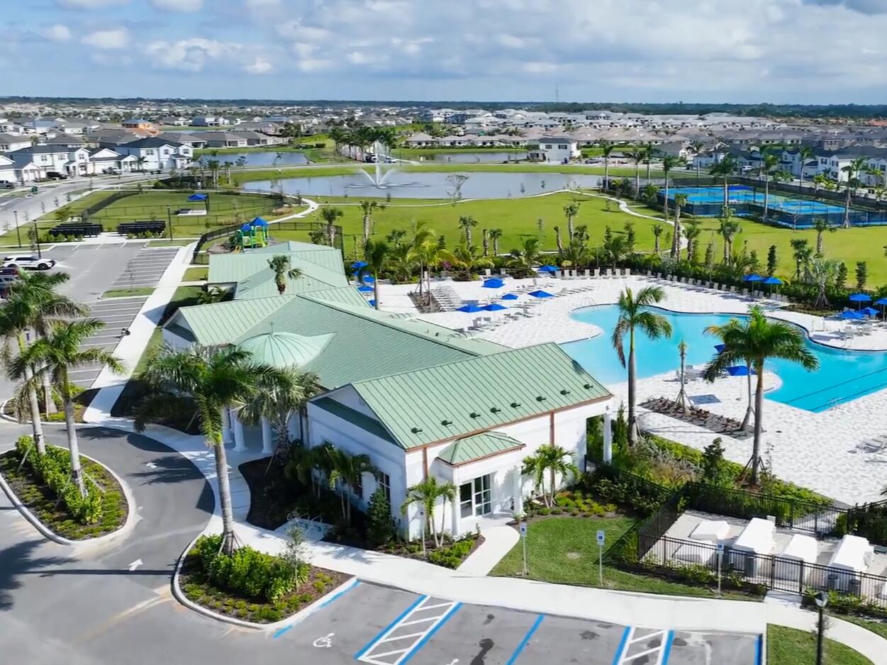 12957 Southwest Forli Way Port St. Lucie, FL 34987 - Photo 28 of 31 an aerial view of a house with a lake view