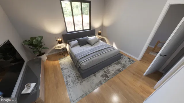 a bedroom with a bed and a window