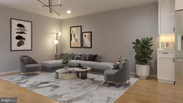 a living room with furniture and flowers