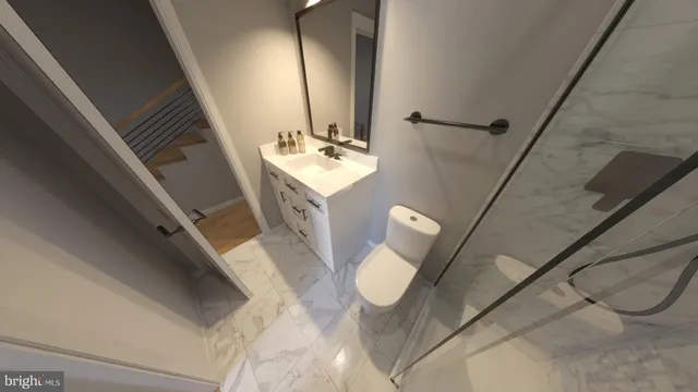 a bedroom with a bed and a large window with wooden floor