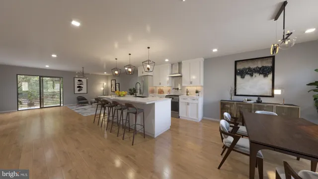 a living room with furniture a dining table and chairs