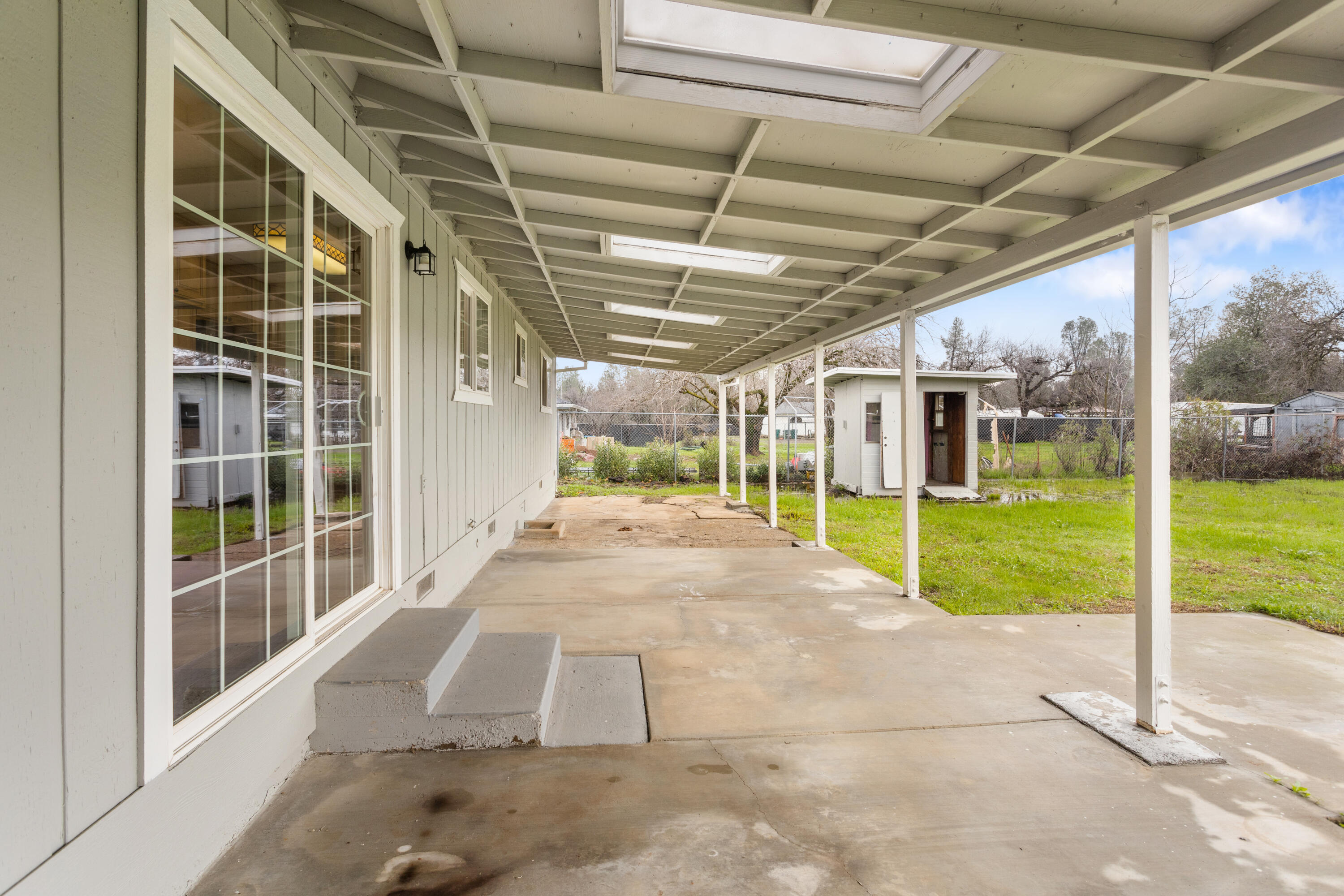 6973 Happy Valley Road Anderson, CA 96007 - Photo 12 of 36 a view of a porch with a backyard