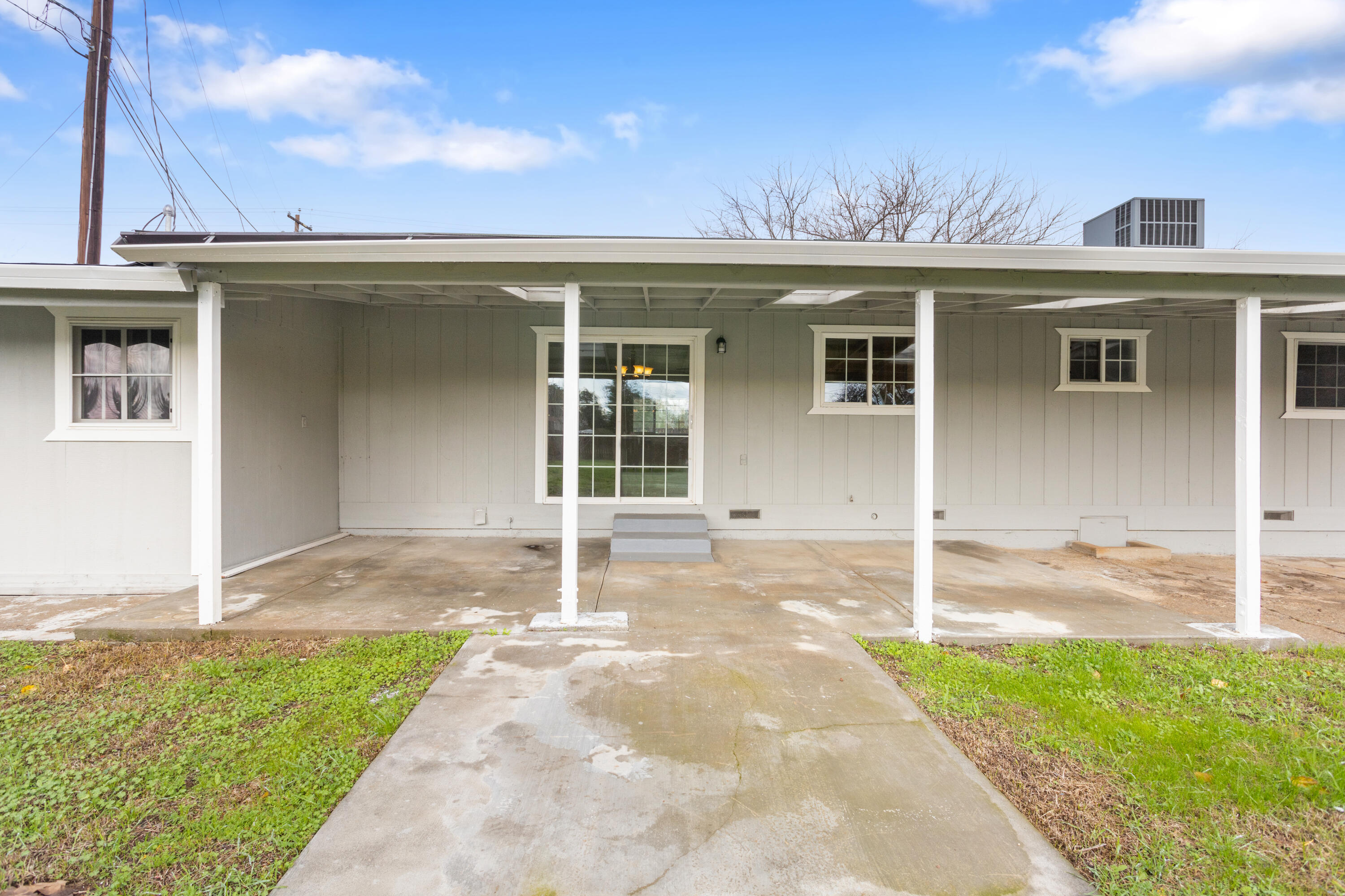 6973 Happy Valley Road Anderson, CA 96007 - Photo 13 of 36 front view of a house with a yard