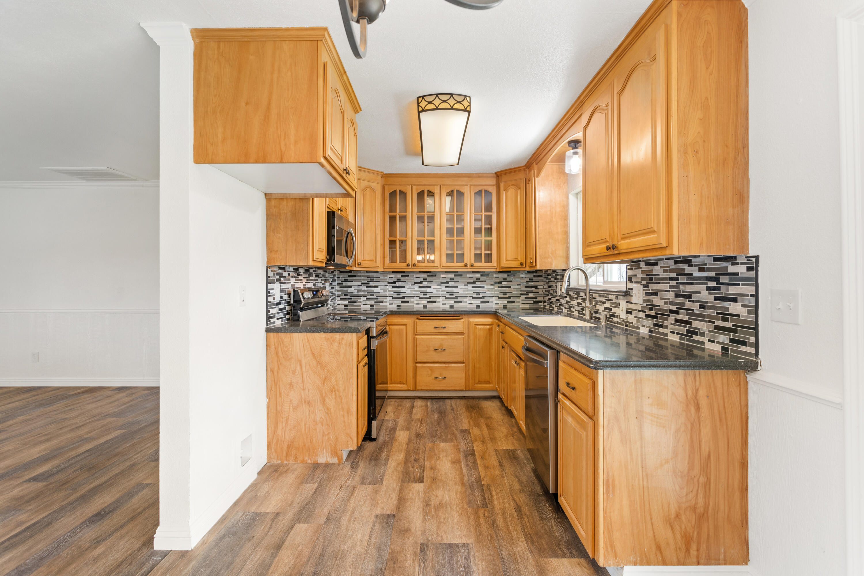 6973 Happy Valley Road Anderson, CA 96007 - Photo 17 of 36 a bathroom with a sink and a bathtub