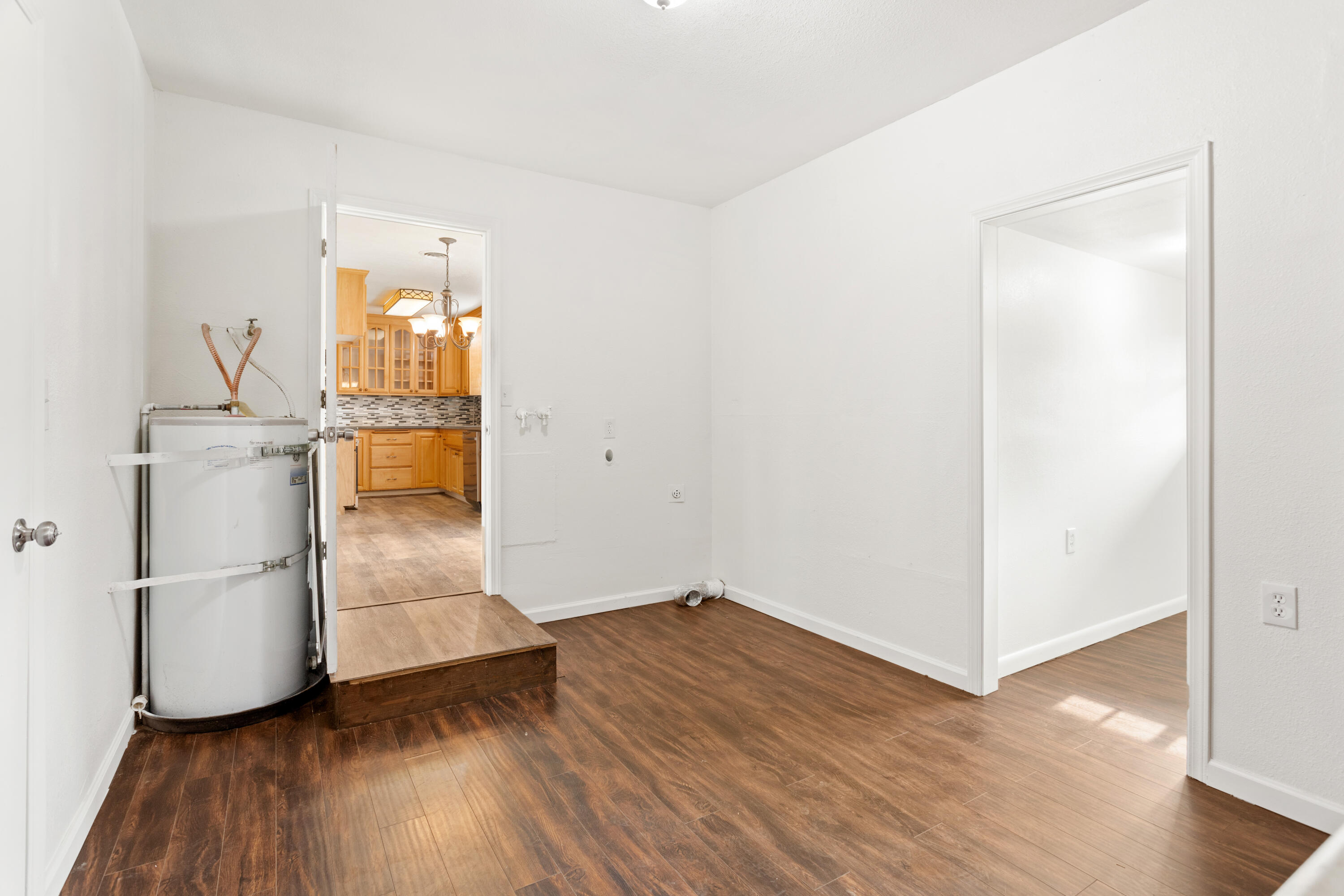 6973 Happy Valley Road Anderson, CA 96007 - Photo 30 of 36 a view of empty room with wooden floor