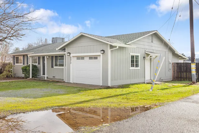 a view of a house with a swimming pool