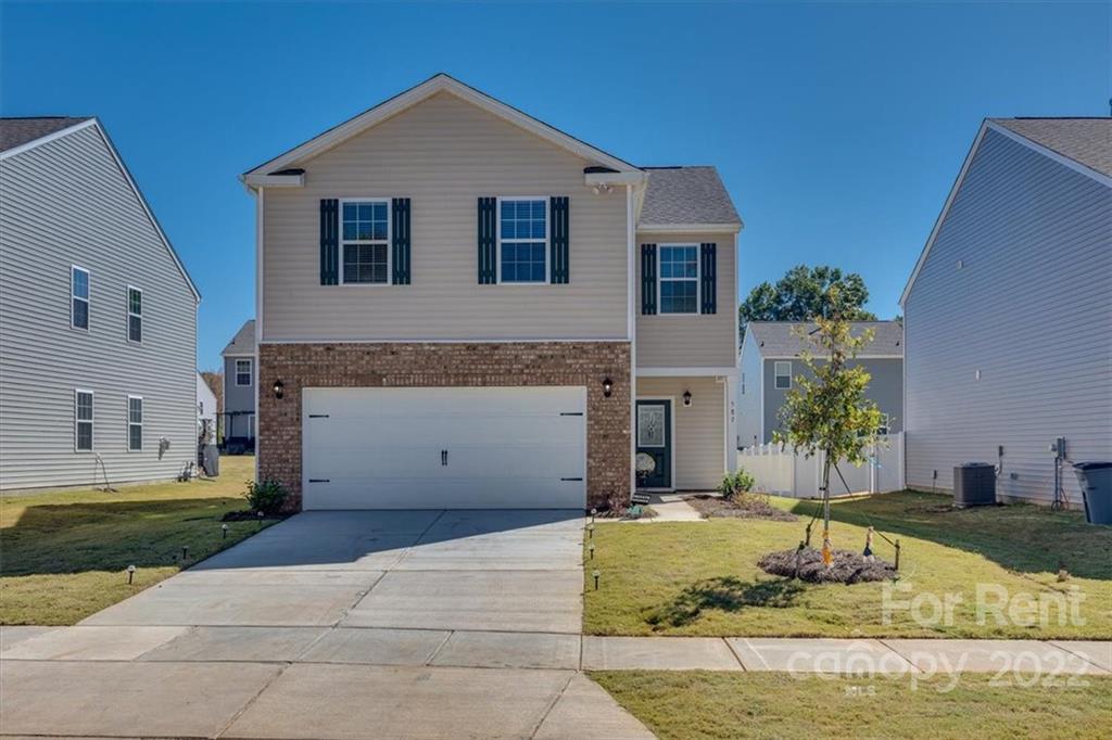 a view of a house with swimming pool