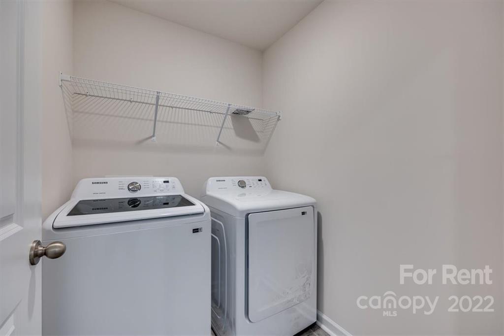 587 King Clover Lane Clover, SC 29710 - Photo 12 of 25 a utility room with dryer and washer