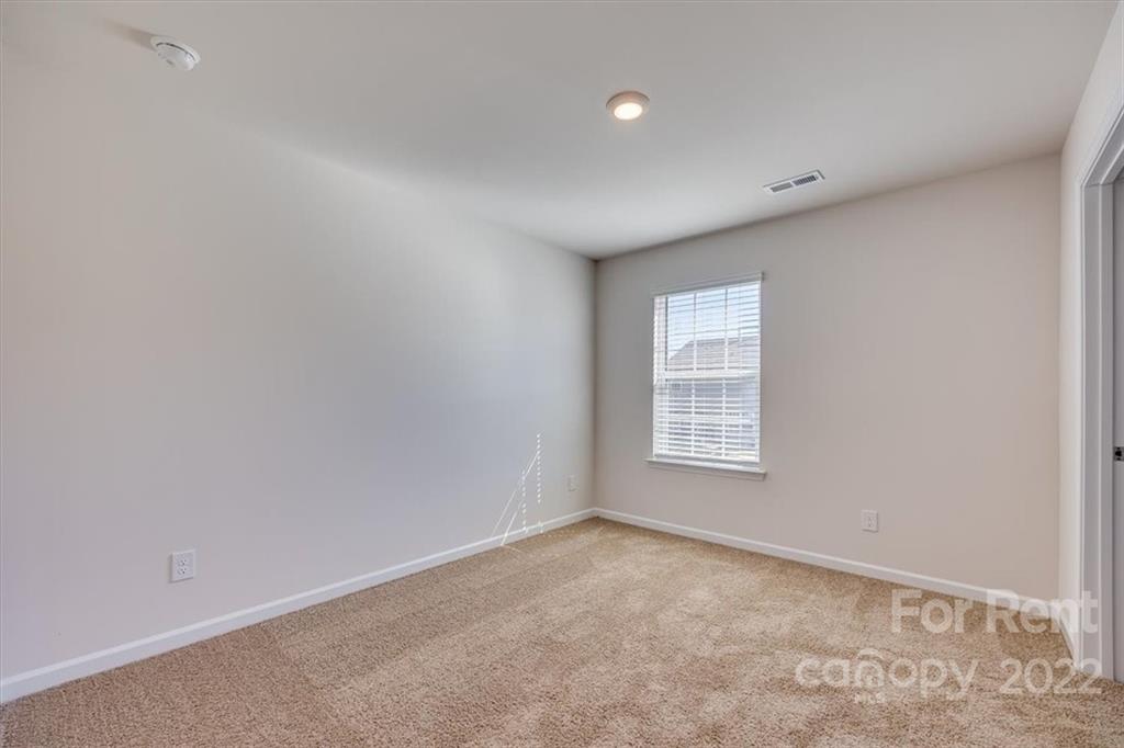 587 King Clover Lane Clover, SC 29710 - Photo 14 of 25 a view of an empty room with a window