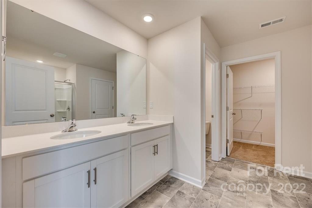 587 King Clover Lane Clover, SC 29710 - Photo 17 of 25 a bathroom with a double vanity sink mirror and double