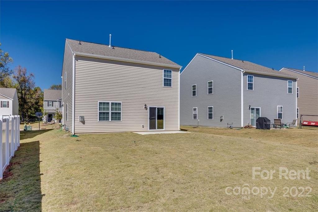 587 King Clover Lane Clover, SC 29710 - Photo 22 of 25 a view of a house with a outdoor space