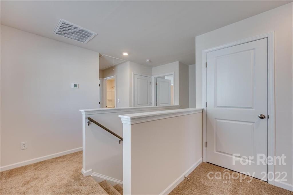 587 King Clover Lane Clover, SC 29710 - Photo 10 of 25 a view of kitchen and wooden floor