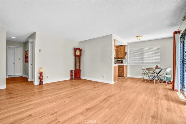 a dining room with a table and chairs
