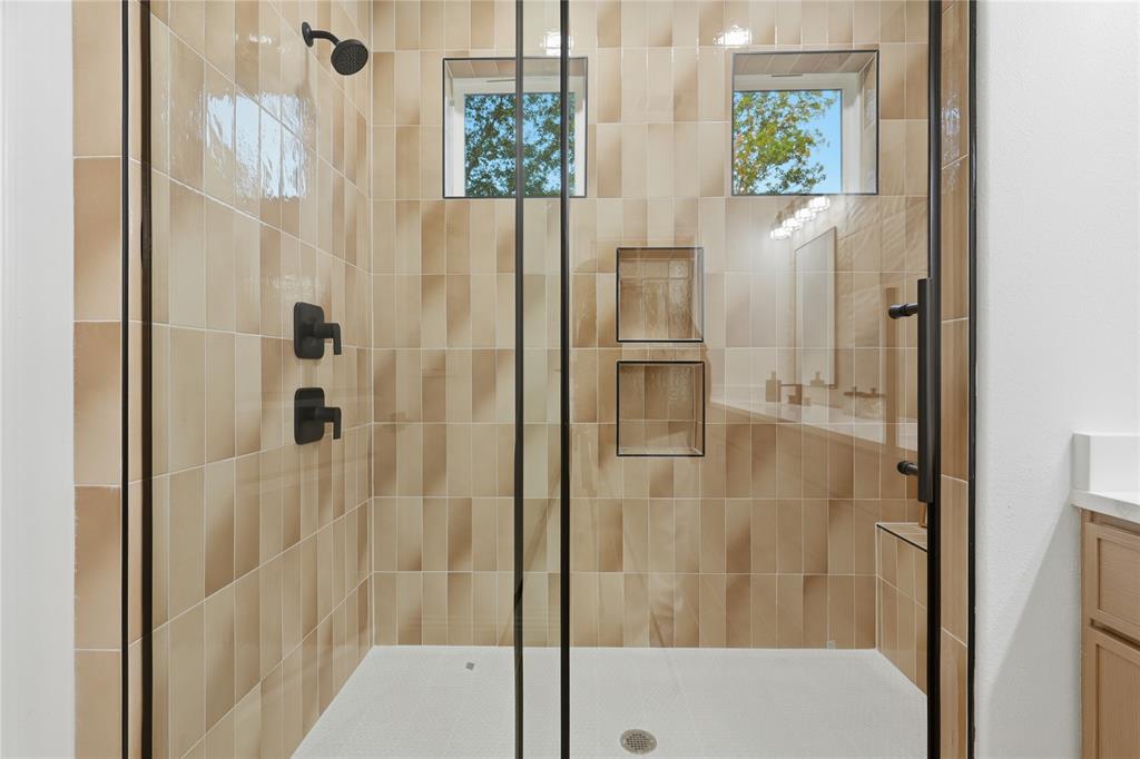 2150 Lakeview Mabank, TX 75156 - Photo 27 of 36 a bathroom with a shower and a mirror