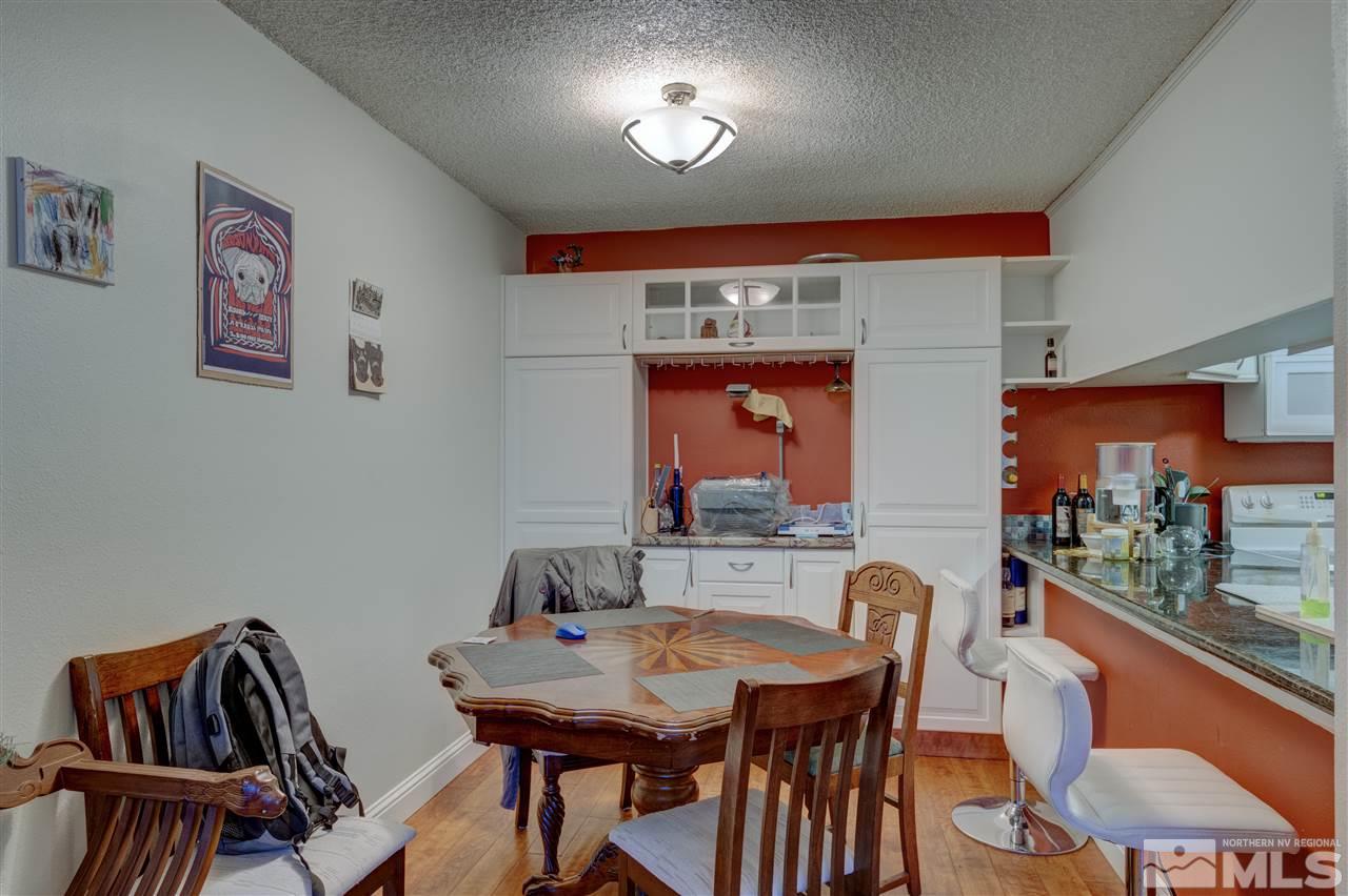 2700 Plumas Street, Unit 322 Reno, NV 89509 - Photo 14 of 18 a view of a dining room with furniture