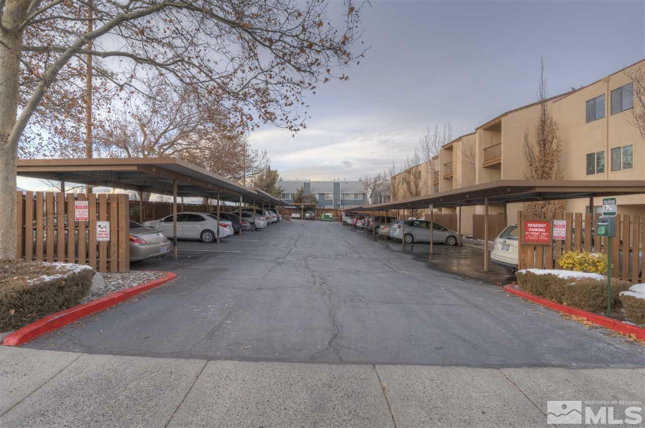 2700 Plumas Street, Unit 322 Reno, NV 89509 - Photo 2 of 18 a view of street with parked cars